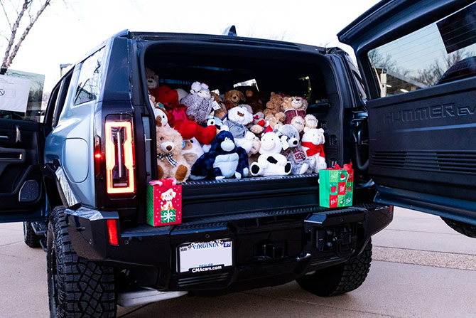 Stuffed animals in the back of a Hummer