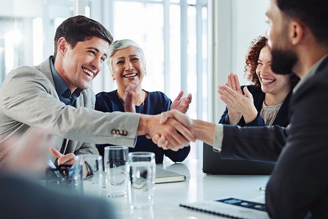 Program Partners. Shaking hands in business meetings.