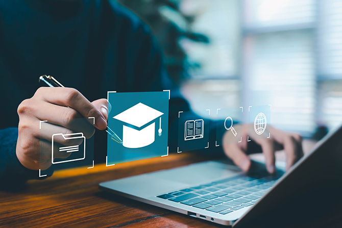 Stronger Tools. Person at laptop.