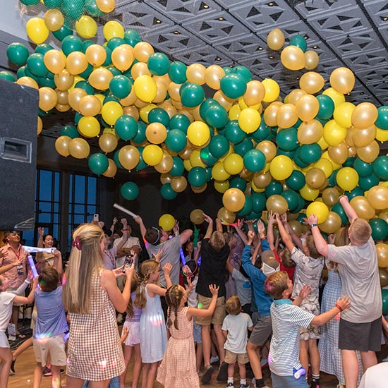 People dancing with balloons